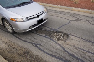Pothole Damage and Auto Insurance Redlands CA